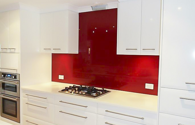 Kitchen glass splashbacks in red crimson colour